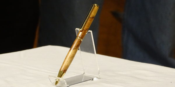 Don Gaudet [R] received pen from Steve Hutcheon [L]