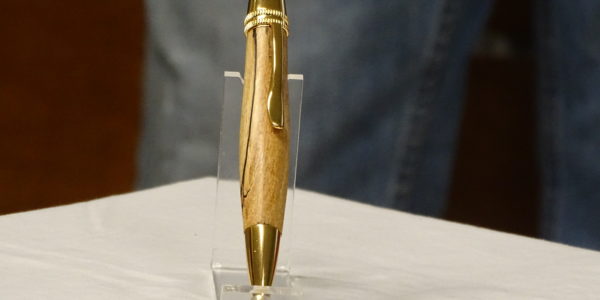 Paul Kidson [L] received pen from Rick Sullivan [R]